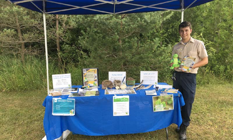 Staff at a display table